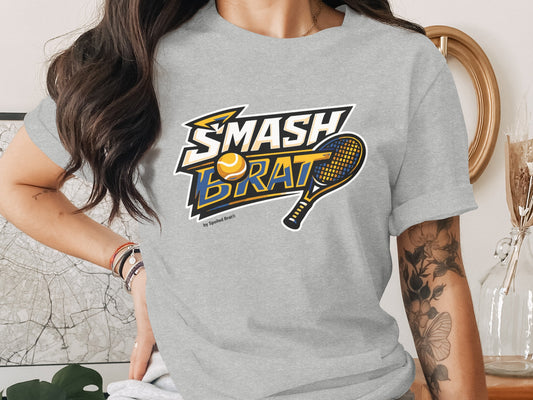 Gray t-shirt with "SMASH BRAT" text, tennis ball, and racket graphic.