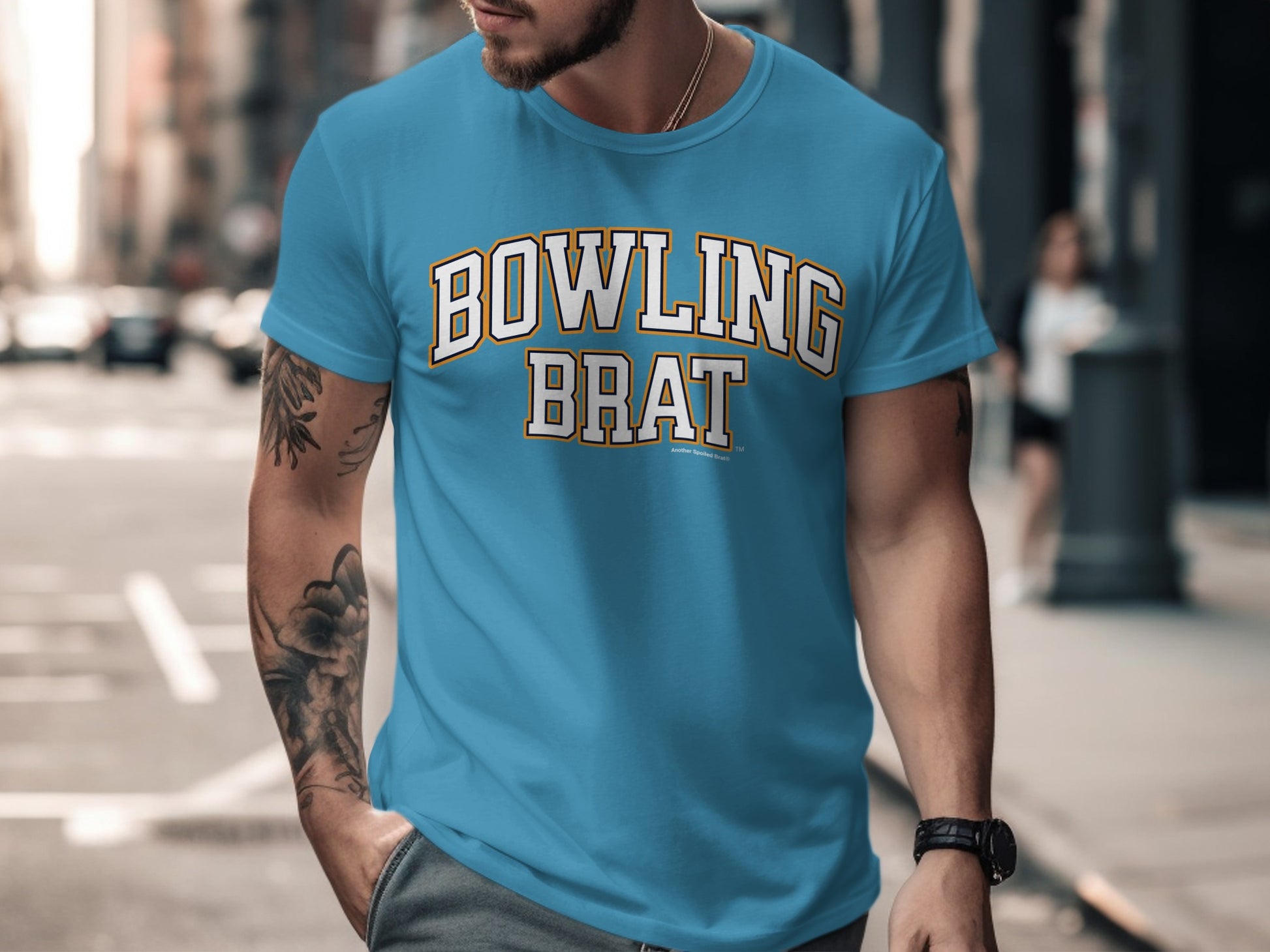 Turquoise t-shirt with "BOWLING BRAT" text in white and yellow.