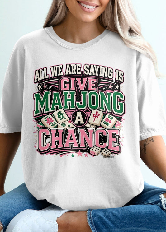 White t-shirt with "Give Mahjong a Chance" text and mahjong tiles.