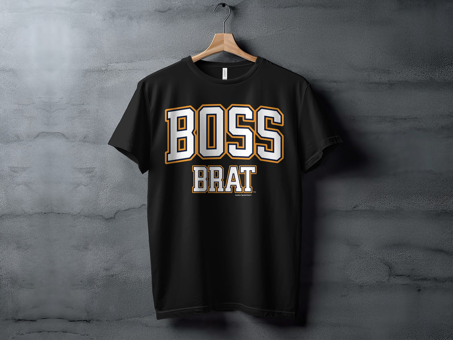 Black t-shirt with white and orange "BOSS BRAT" text graphic.
