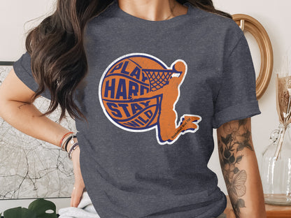 Orange basketball player silhouette dunking with text around ball.