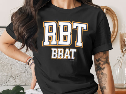 Black t-shirt with white and yellow "RBT BRAT" text, with smaller text below.
