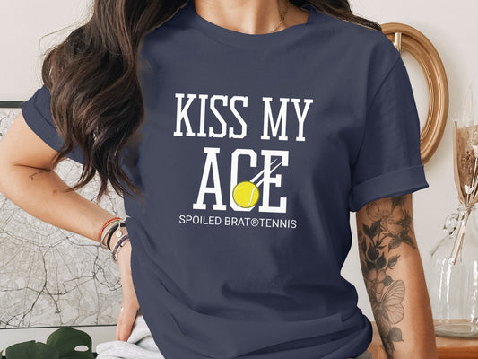Navy t-shirt with "KISS MY ACE" and tennis ball graphic.