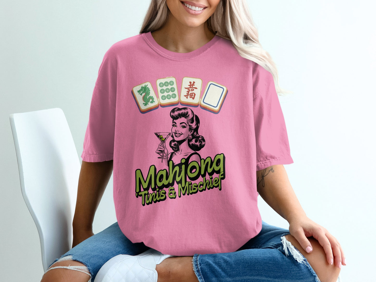 Pink t-shirt with a retro woman and Mahjong tiles graphic.