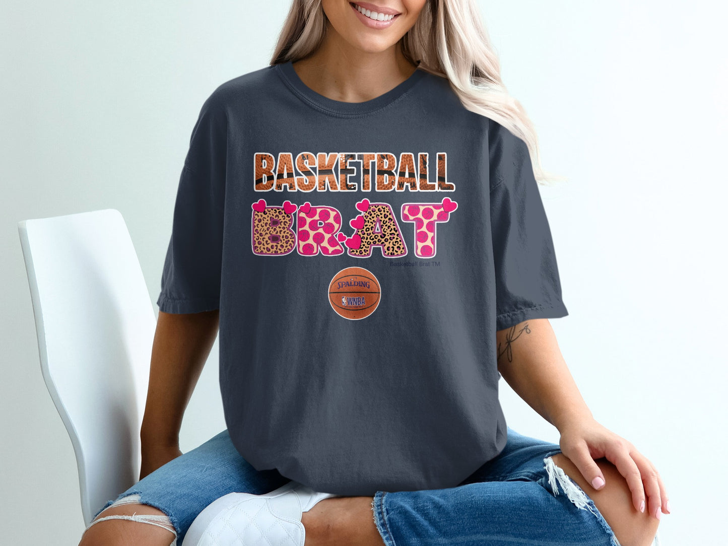 Dark gray t-shirt with "Basketball Brat" text and leopard print, NBA logo.
