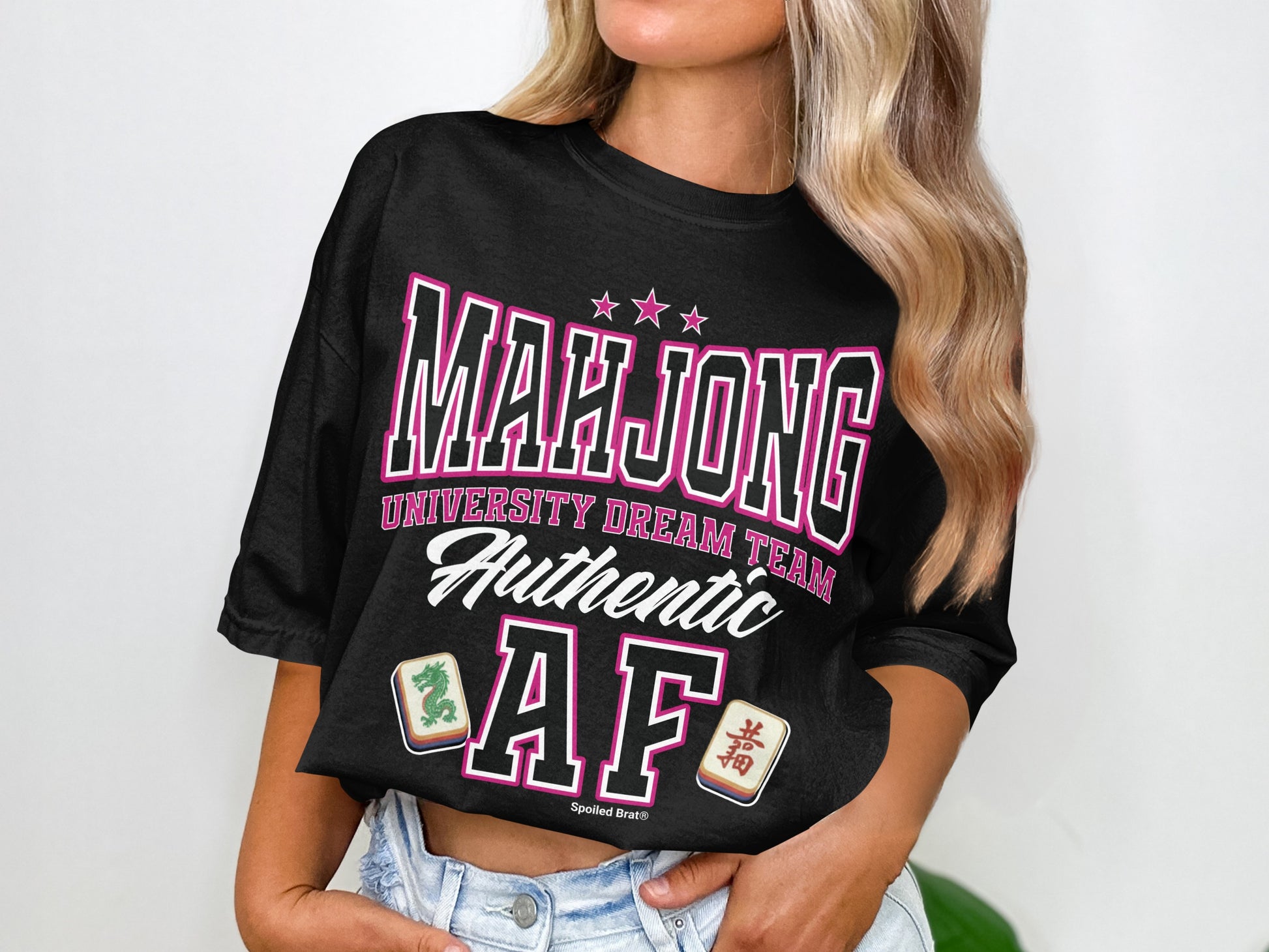 Black t-shirt with "Mahjong University Dream Team Authentic AF" in pink lettering.