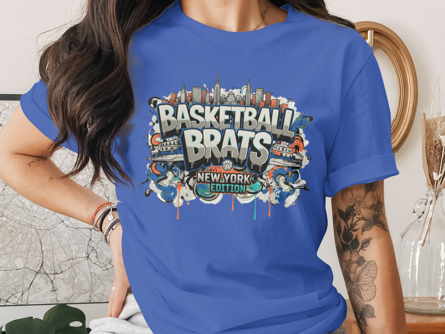 Blue t-shirt with "Basketball Brats New York Edition" graphic and city skyline.