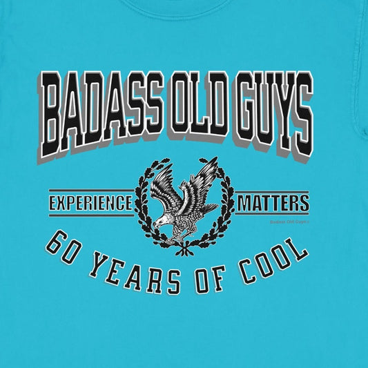 Turquoise t-shirt with "Badass Old Guys Experience 60 Years of Cool" text and eagle graphic.