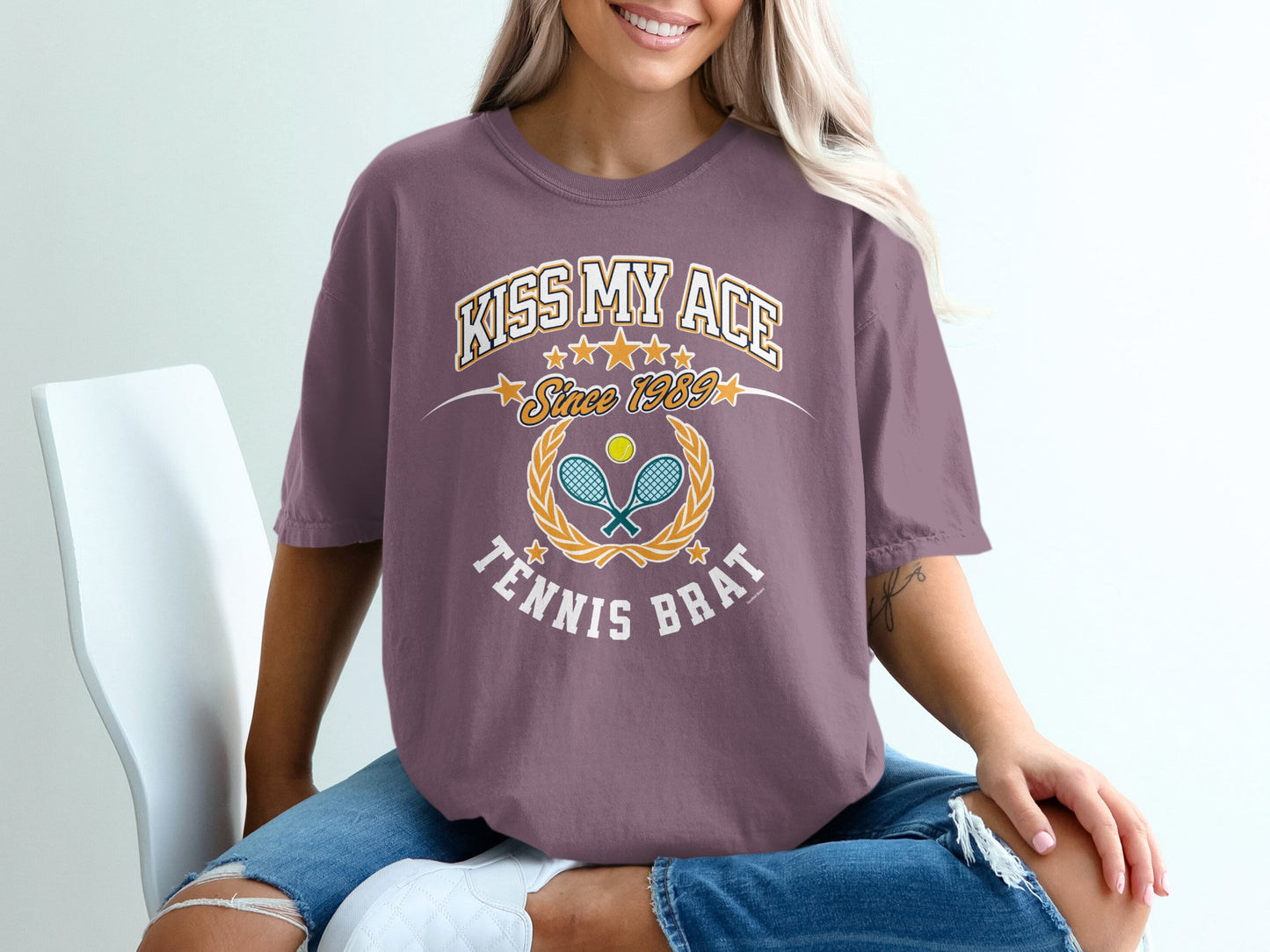 T-shirt with "Kiss My Ace Since 1989 Tennis Brat" text and tennis graphics.