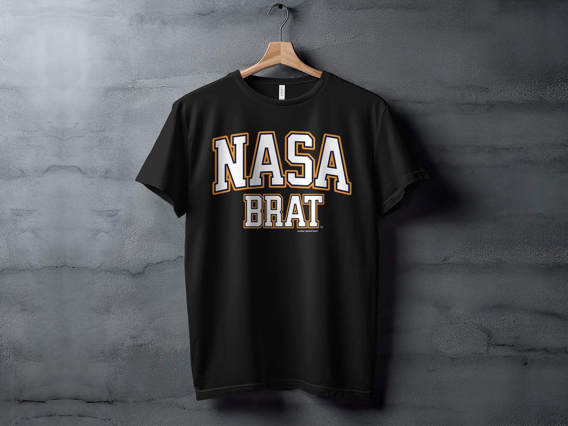 Black t-shirt with "NASA BRAT" text in white and orange collegiate font.