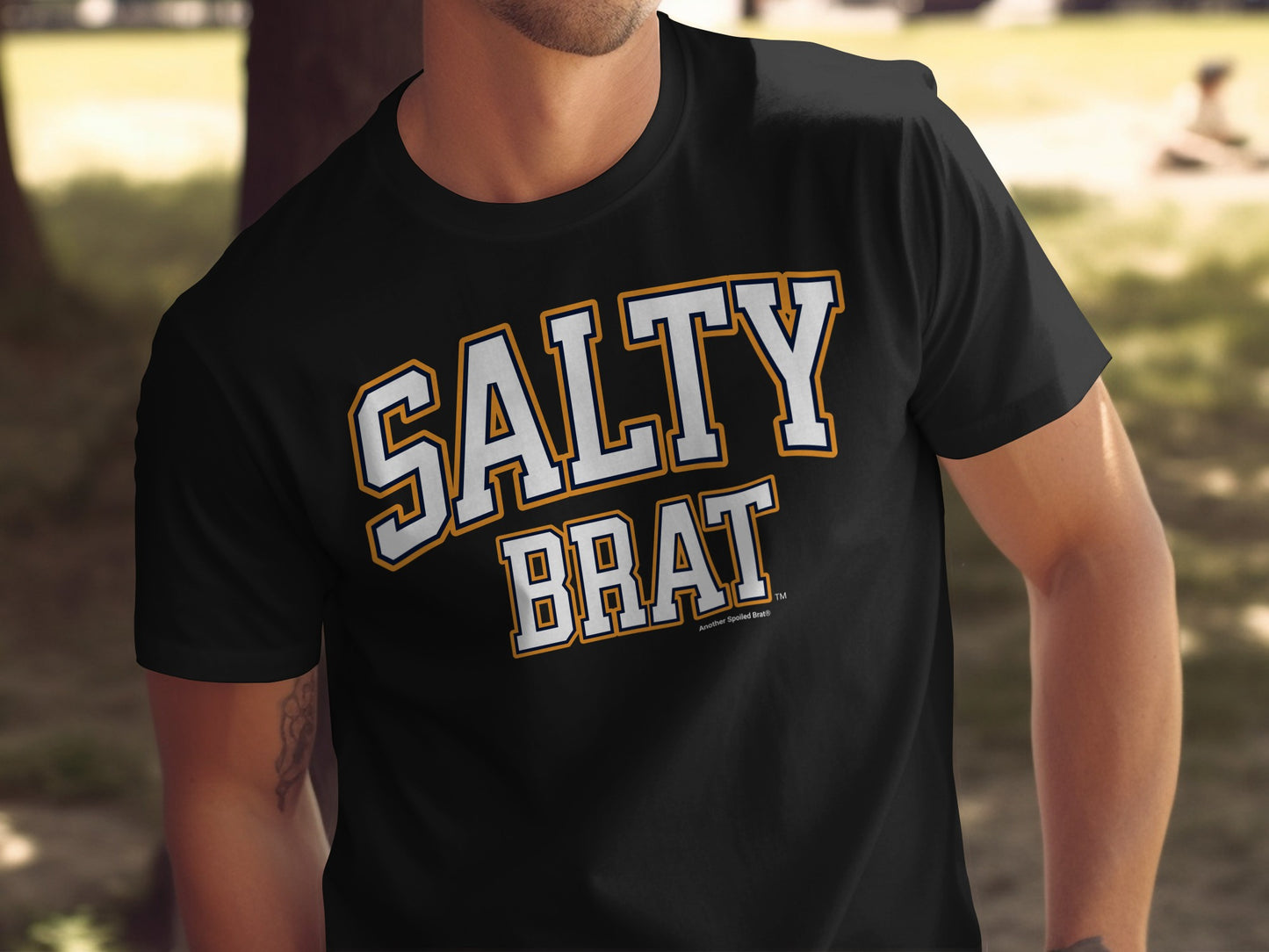 Black t-shirt with "SALTY BRAT" text, and "Another Spoiled Brat" at the bottom.