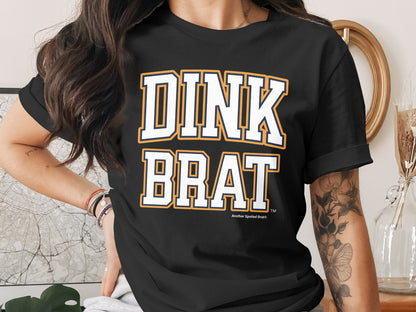 Black t-shirt with "DINK BRAT" in collegiate-style font.