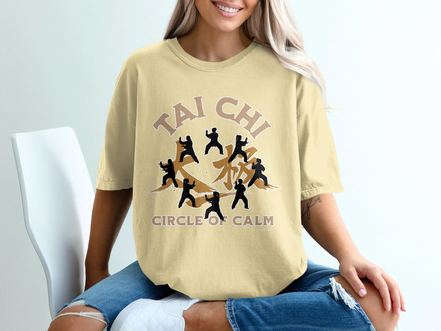 Yellow t-shirt with "Tai Chi Circle of Calm" and silhouetted figures.