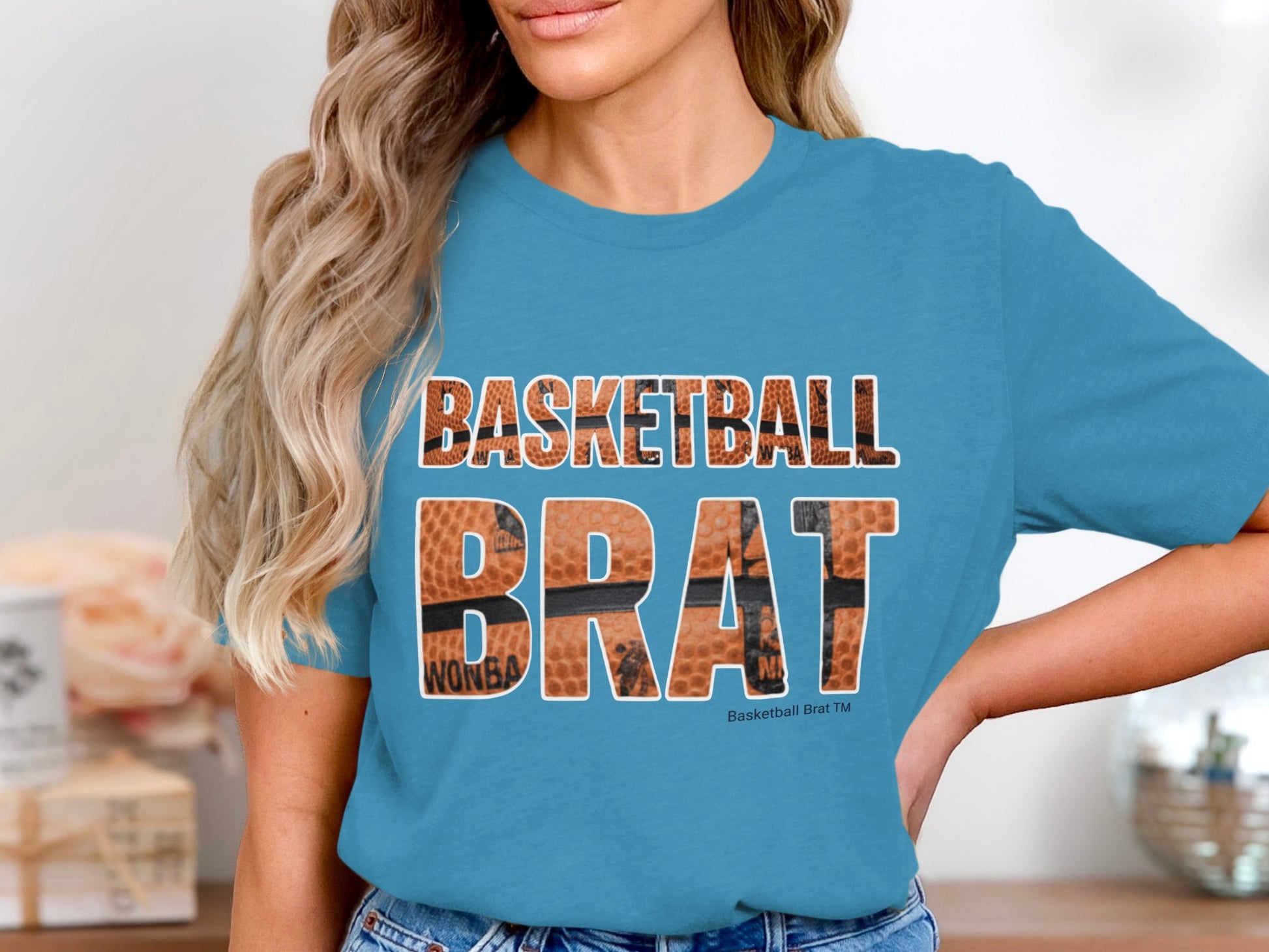 Blue t-shirt with "BASKETBALL BRAT" text in basketball texture.