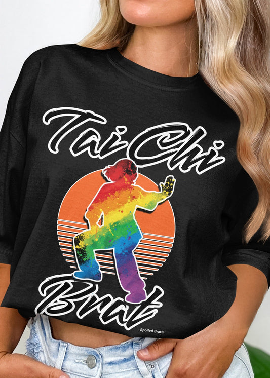 Black t-shirt with rainbow Tai Chi figure and "Tai Chi Brat" text.