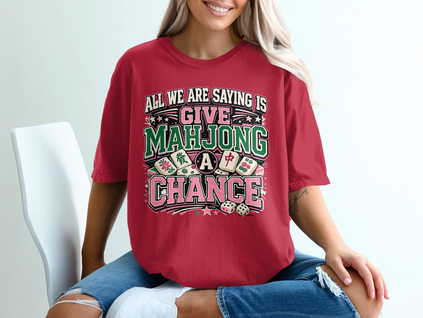 Red t-shirt with "Give Mahjong a Chance" text and mahjong tiles.