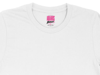 White t-shirt neck tag with "Aquarius Brat" and small text.