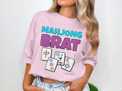 Pink t-shirt with "Mahjong Brat" text and Mahjong tiles.