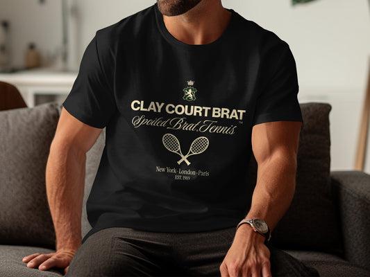 Black t-shirt with "Clay Court Brat" and tennis rackets.