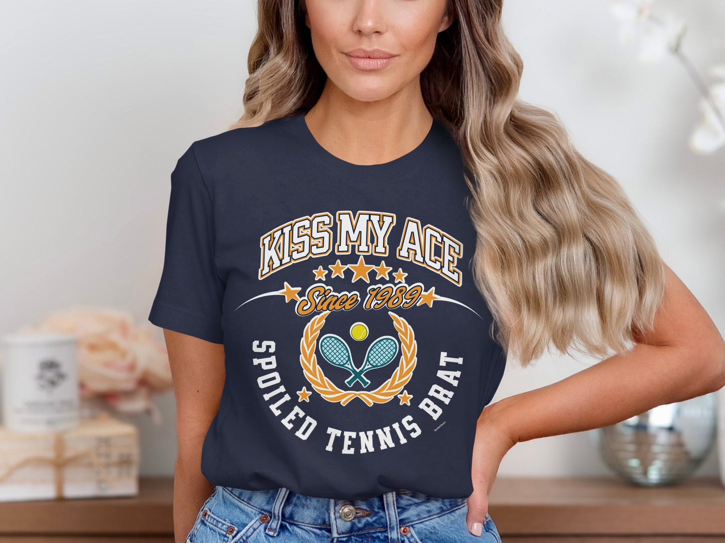 Navy t-shirt with "Kiss My Ace" and tennis imagery.