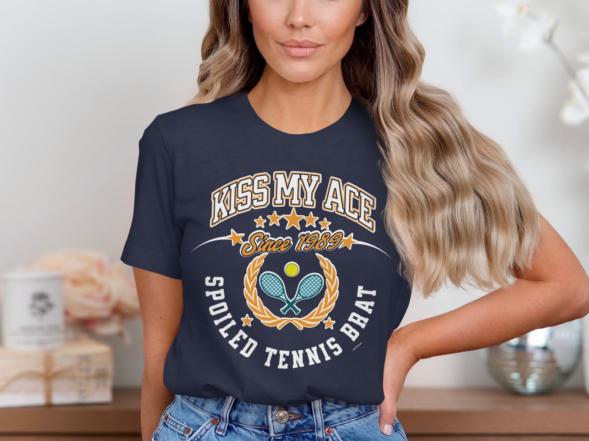 Navy t-shirt with "Kiss My Ace" and tennis imagery.