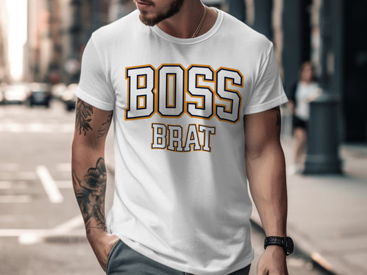 White t-shirt with "BOSS BRAT" text in blue and gold block letters.