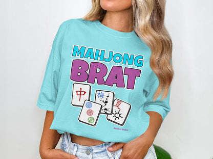 Aqua t-shirt with "Mahjong Brat" text and four mahjong tiles.