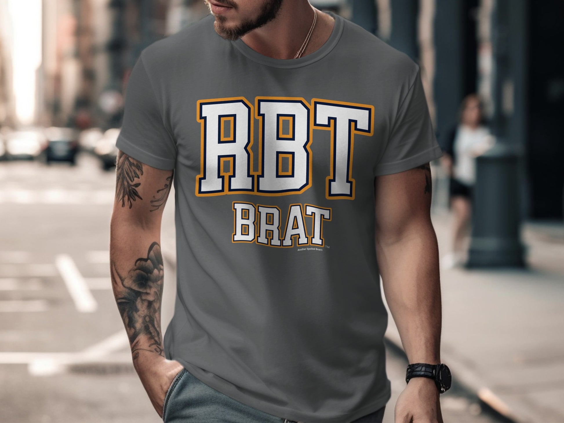 Grey t-shirt with "RBT BRAT" text in white and yellow outline on chest