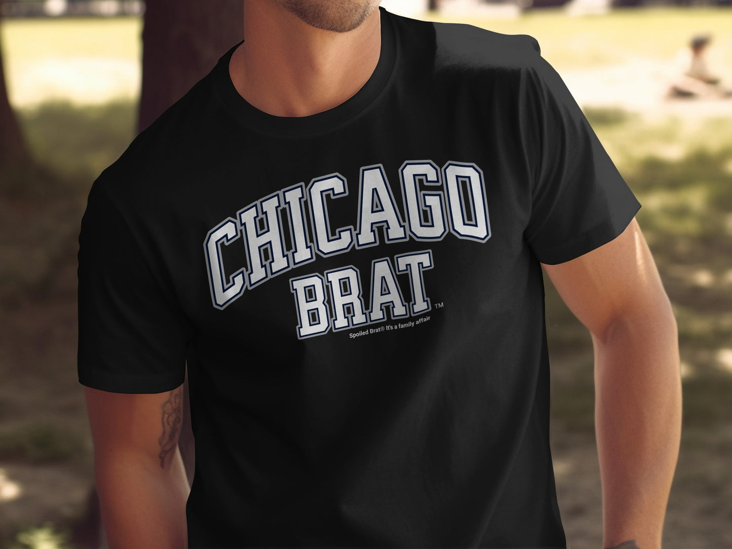 Black t-shirt with "CHICAGO BRAT" in white arched lettering.