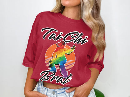 Red t-shirt with rainbow Tai Chi graphic and "Tai Chi Brat" text.