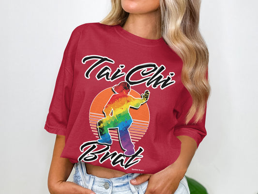 Red t-shirt with rainbow Tai Chi graphic and "Tai Chi Brat" text.