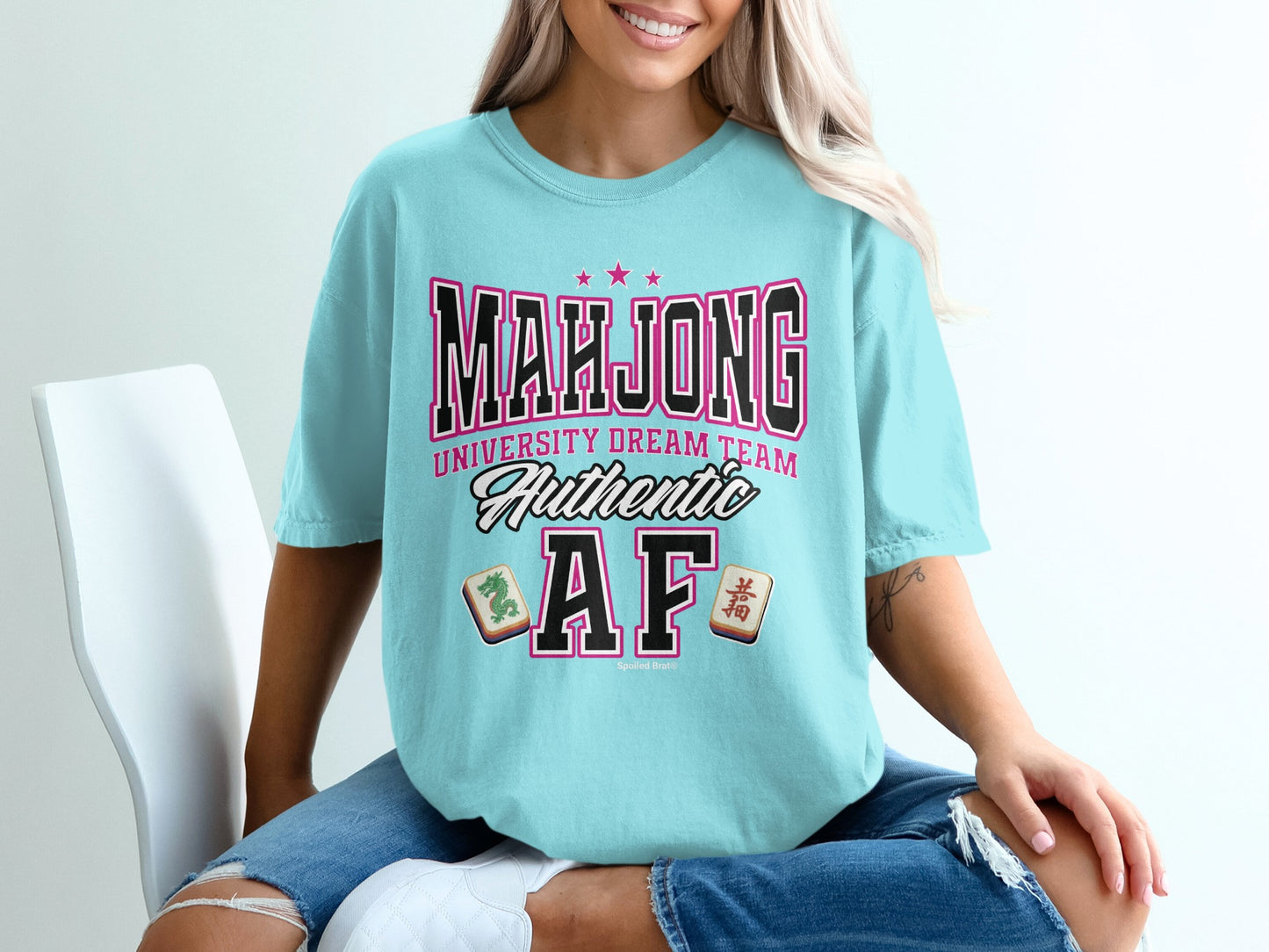 Light blue t-shirt with "Mahjong University Dream Team" and "Authentic" text.
