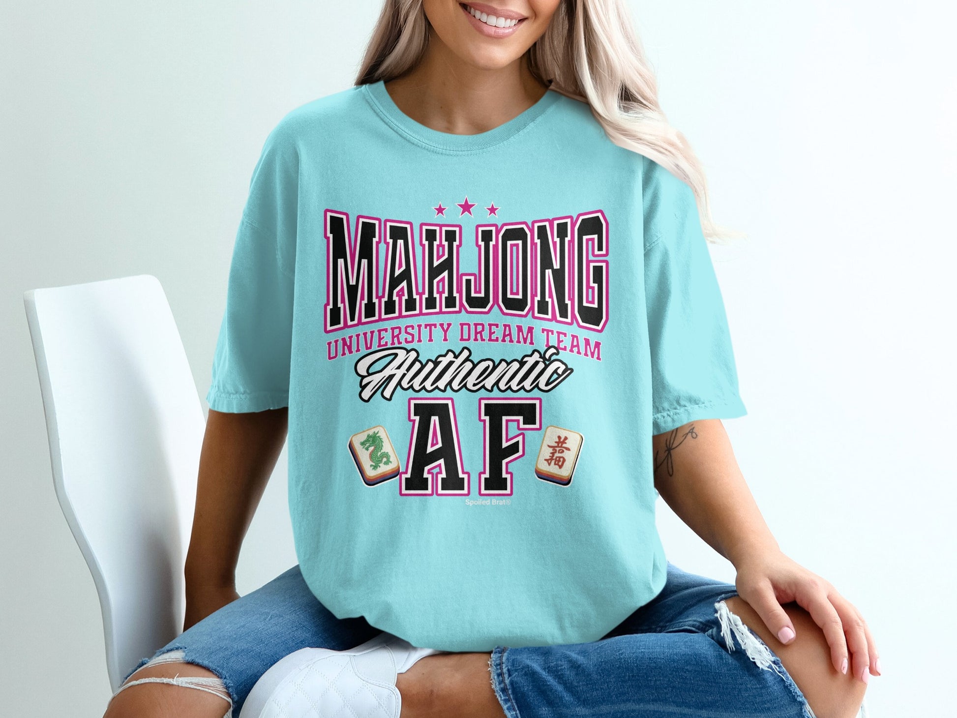 Light blue t-shirt with "Mahjong University Dream Team" and "Authentic" text.