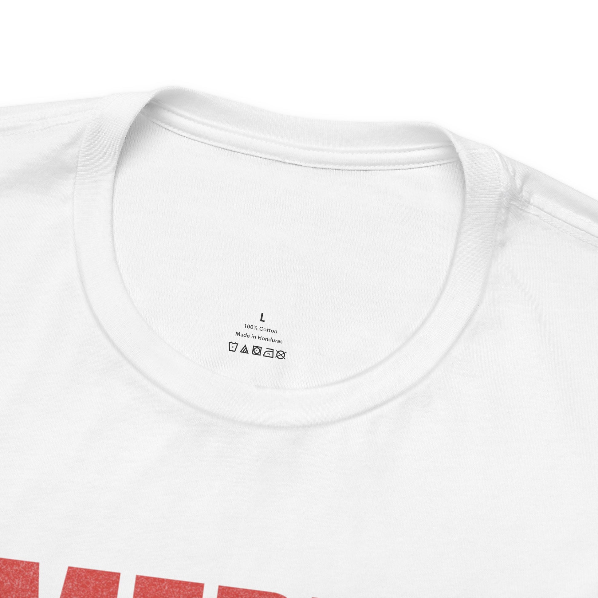 White t-shirt neck label showing size L, 100% Cotton, Made in Honduras.