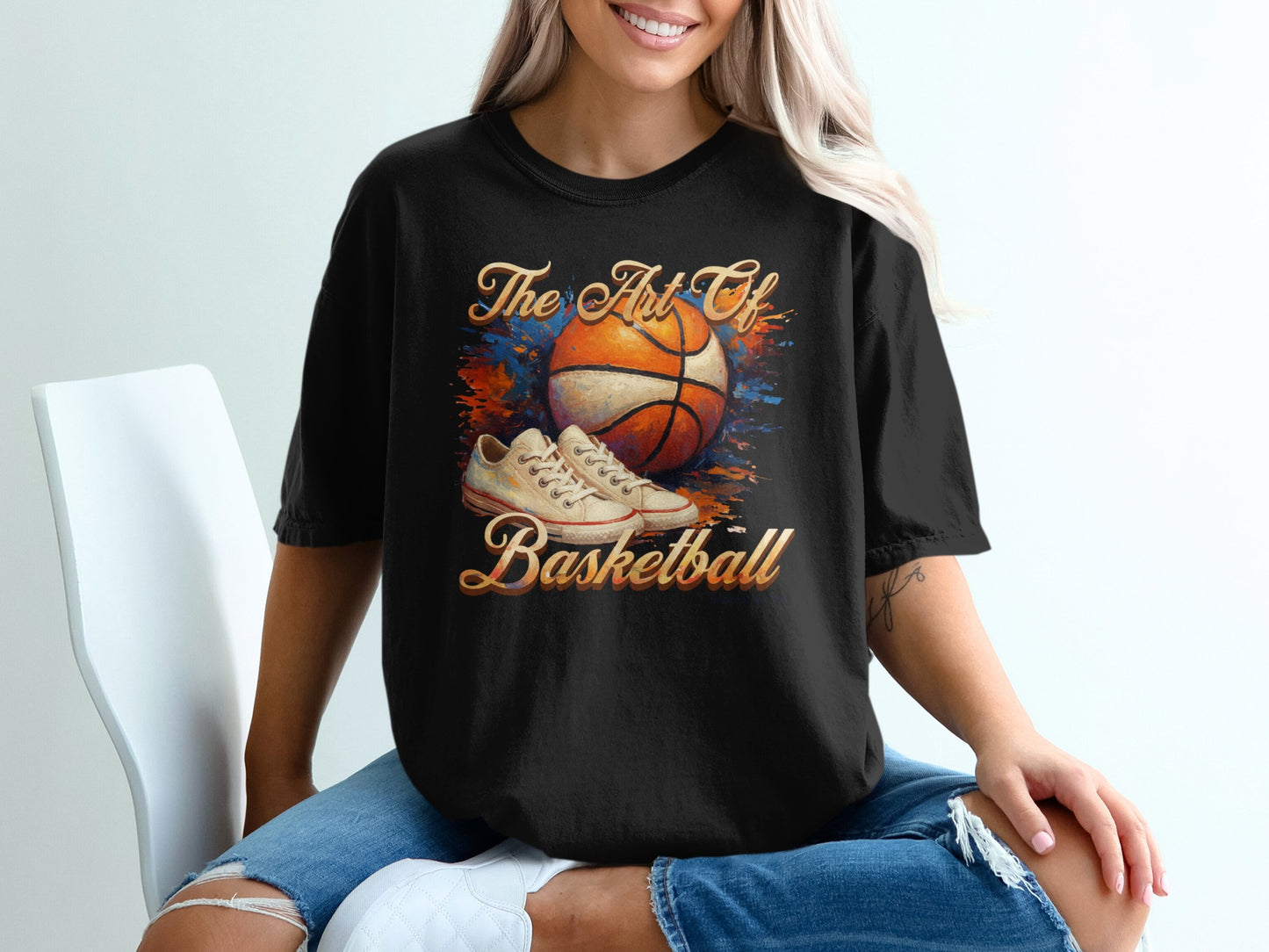 Black t-shirt with "The Art of Basketball" graphic featuring a basketball and sneakers.
