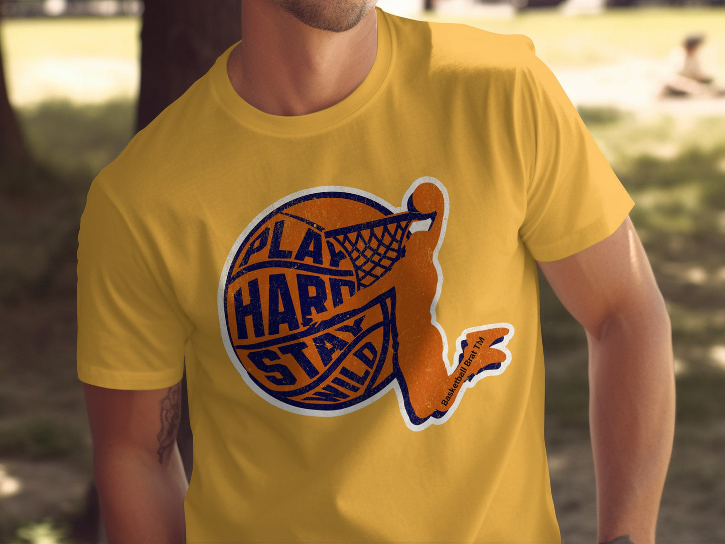 Orange basketball player graphic on a yellow t-shirt.