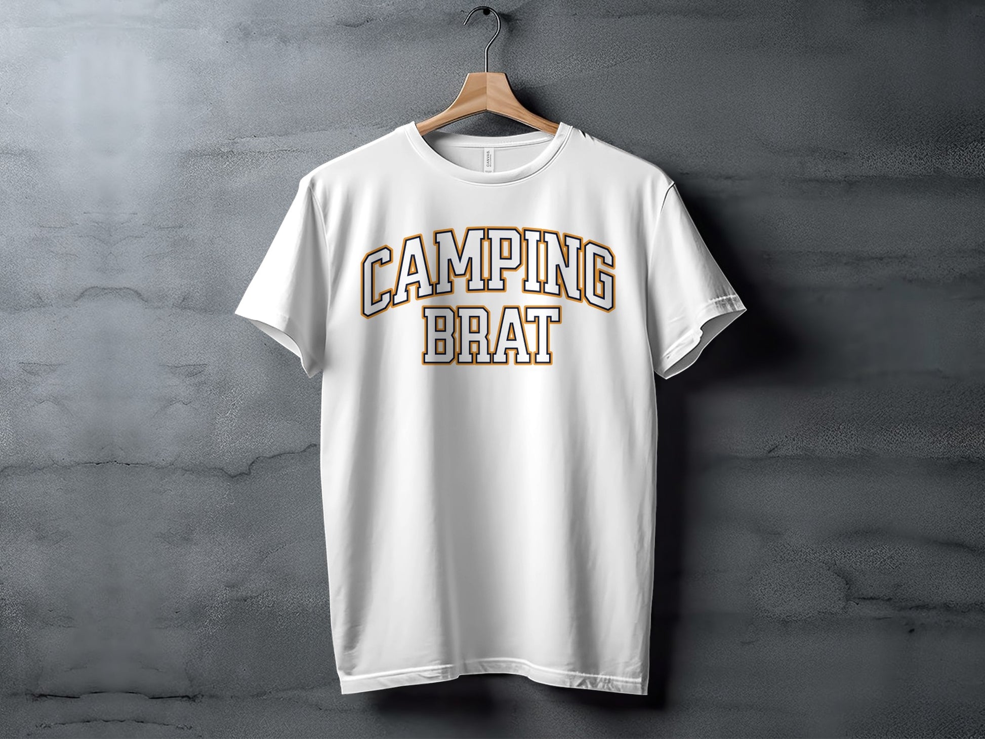 White t-shirt with "CAMPING BRAT" text in arched yellow and white lettering.