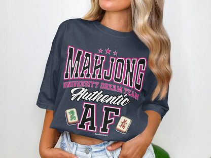 Dark grey t-shirt with "MAHJONG UNIVERSITY DREAM TEAM Authentic AF" text and Mahjong tiles.