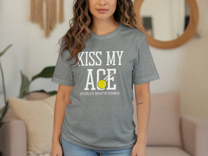 Grey t-shirt with "Kiss My Ace" and tennis ball graphic.