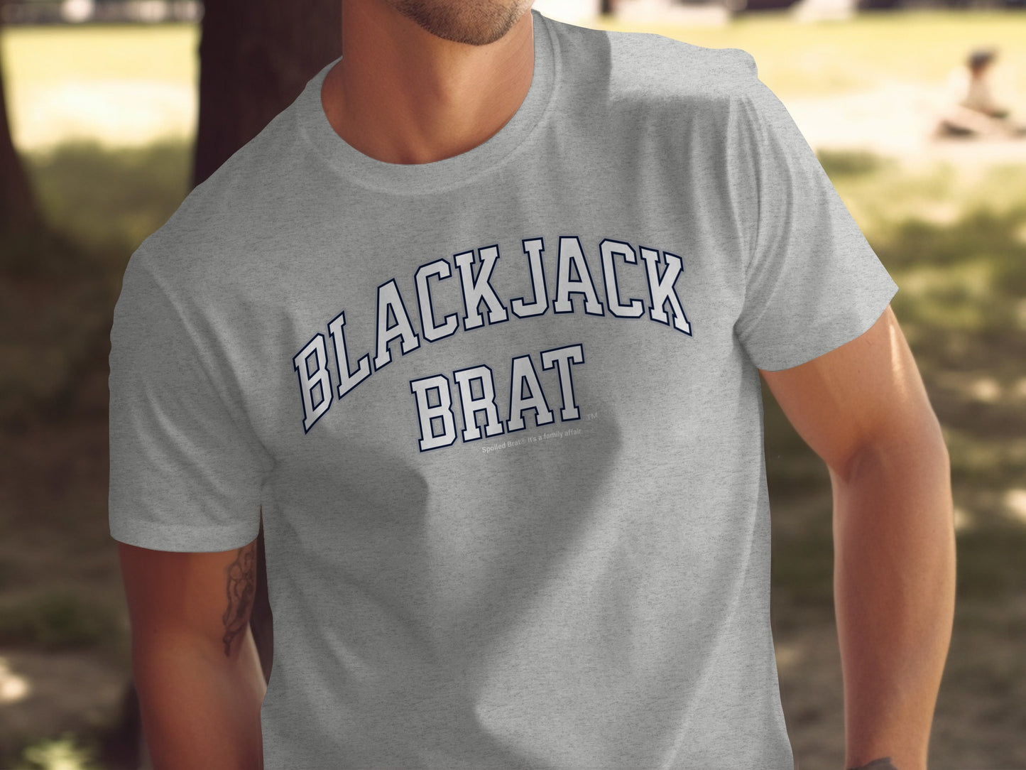 Grey t-shirt with "BLACKJACK BRAT" and "Spoiled Brat® It's a family affair" text.