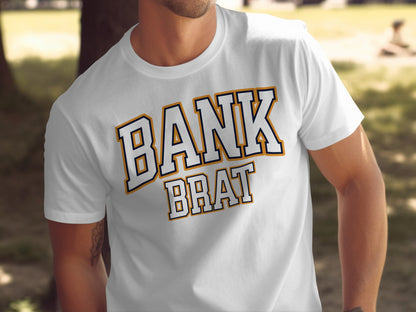 White t-shirt with navy and gold text reading "BANK BRAT"