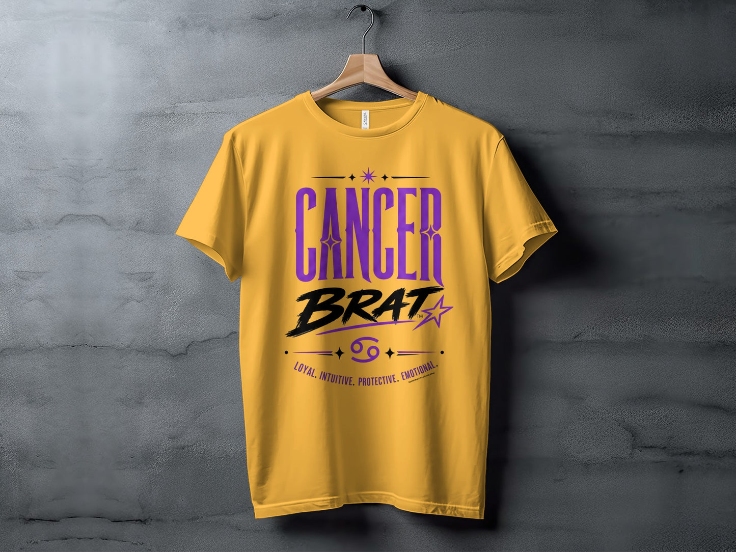 Yellow t-shirt with "CANCER BRAT" logo and zodiac traits.