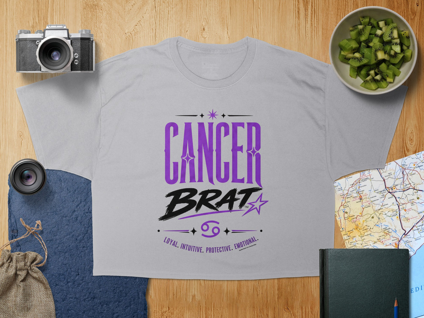 Light gray t-shirt with purple "CANCER BRAT" text and Cancer zodiac symbol.