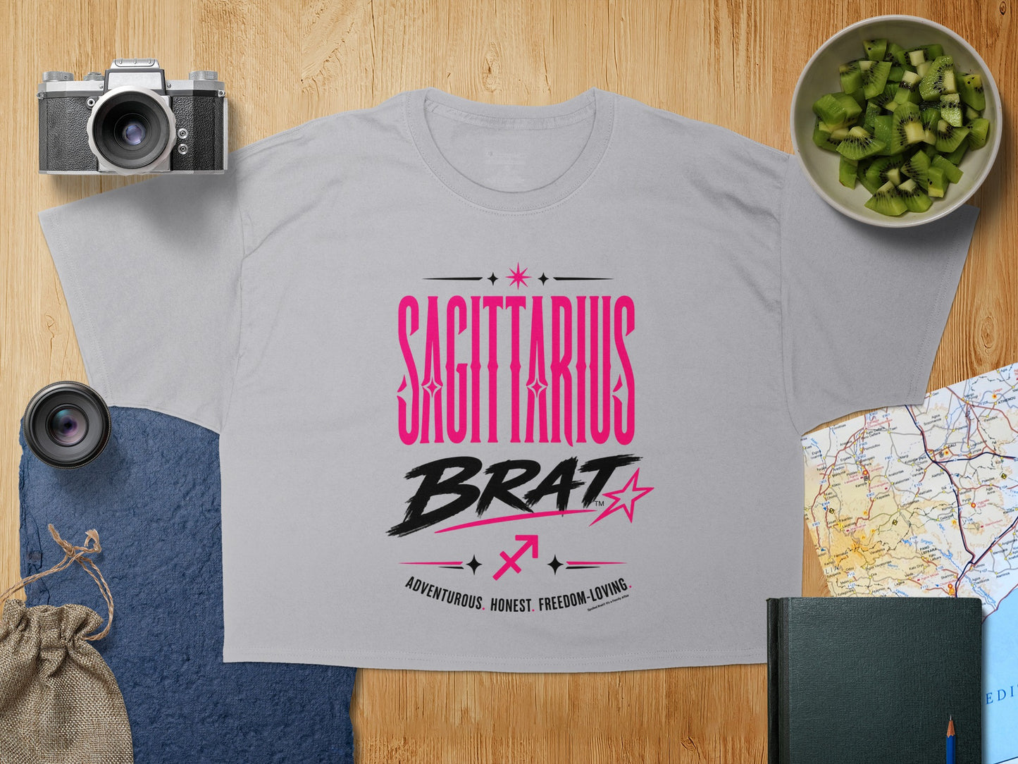 Grey t-shirt with "Sagittarius Brat Adventurous, Honest, Freedom-Loving" text.