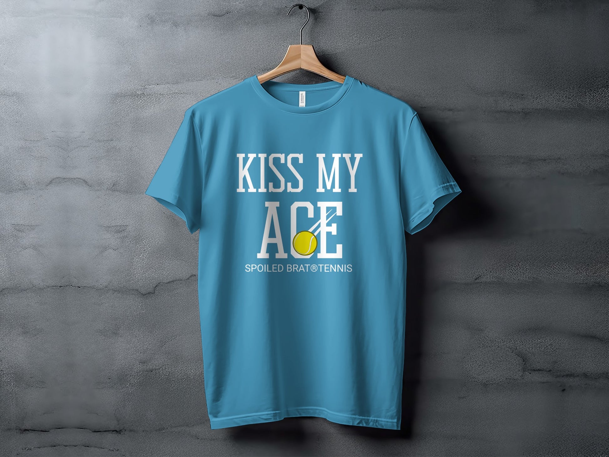 Blue t-shirt with "KISS MY ACE" and tennis ball graphic.