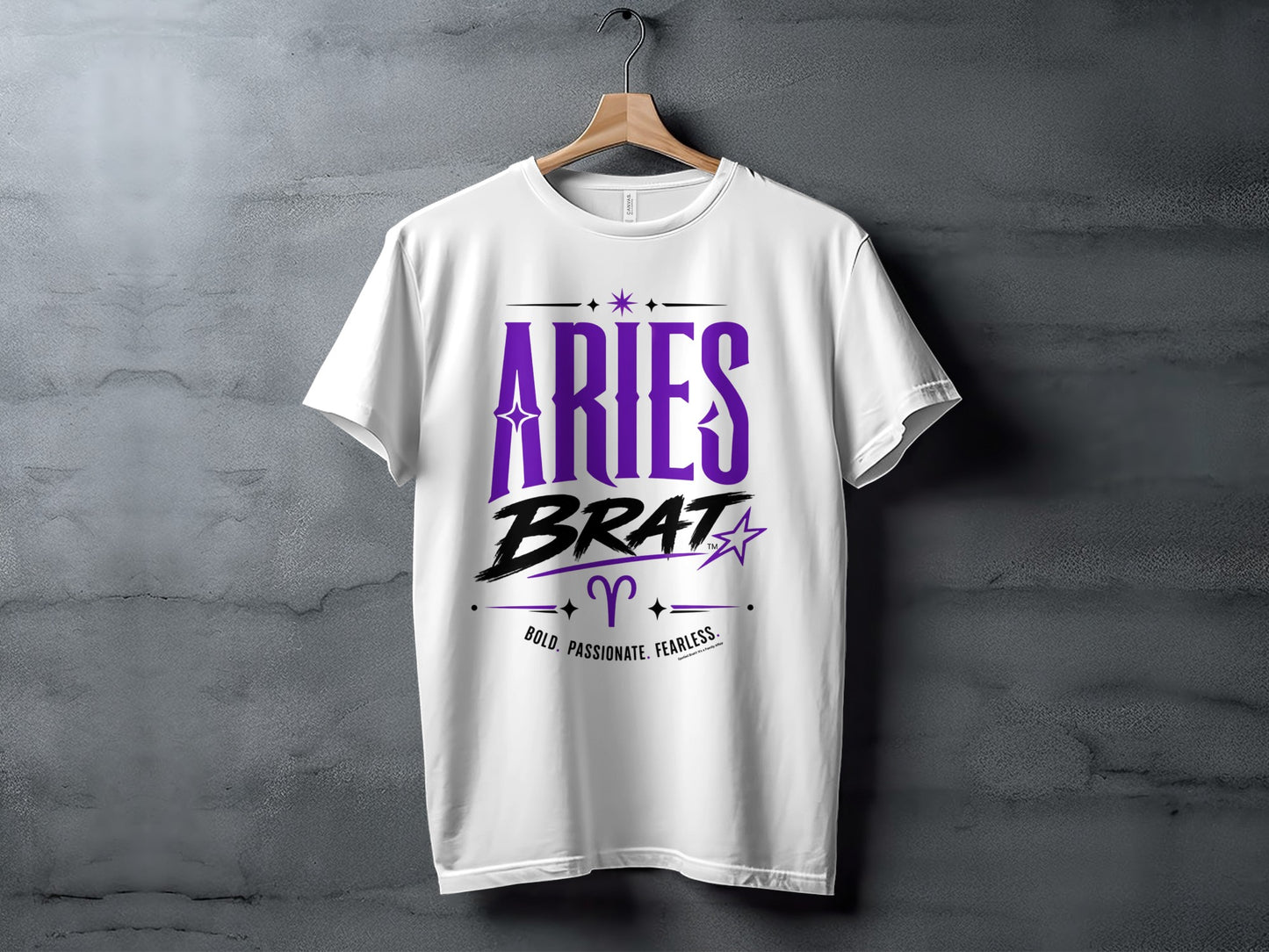 White t-shirt with "Aries Brat" text, Aries symbol, and "Bold. Passionate. Fearless."