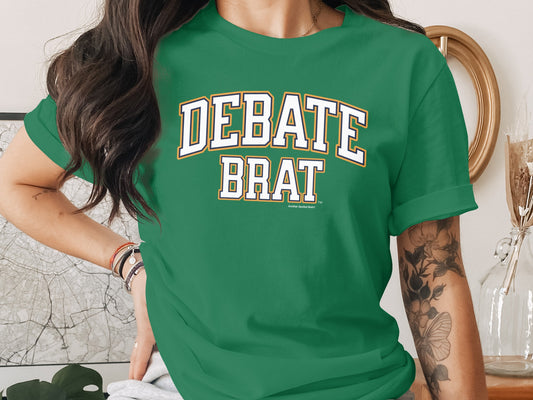 Green t-shirt with white and gold lettering reading "DEBATE BRAT".