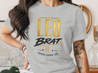 Grey t-shirt with "LEO BRAT" text, Leo sign, and "CONFIDENT GENEROUS LOYAL".