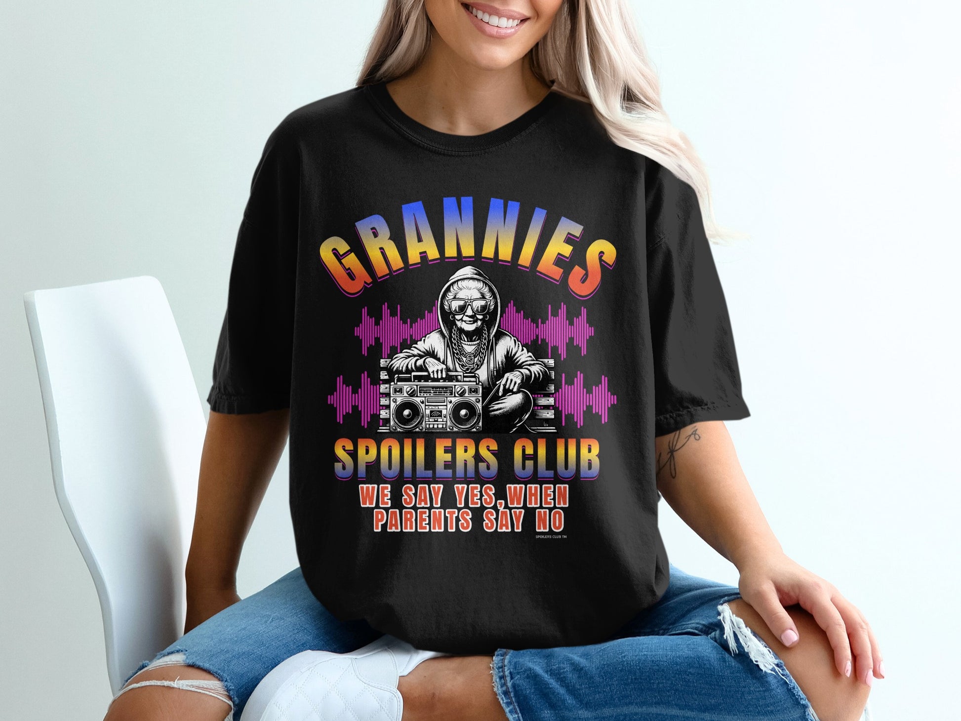Black t-shirt with "GRANNIES" in large rainbow letters and "WE SAY YES. WHEN PARENTS SAY NO."