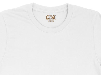 White t-shirt with "CASH BRAT" text in orange and white on the inside tag.